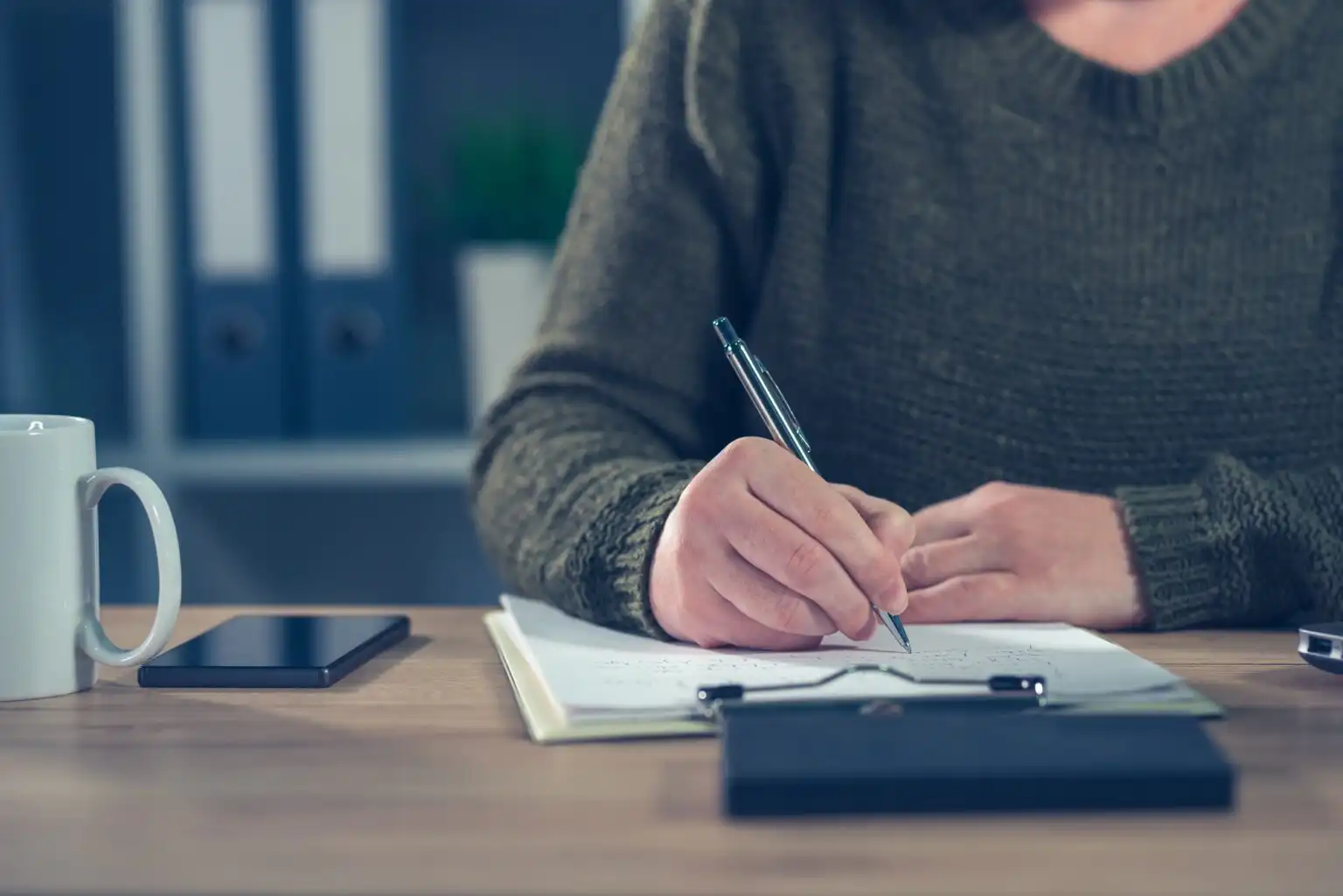 Female freelancer doing paperwork